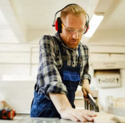 professional woodworker working